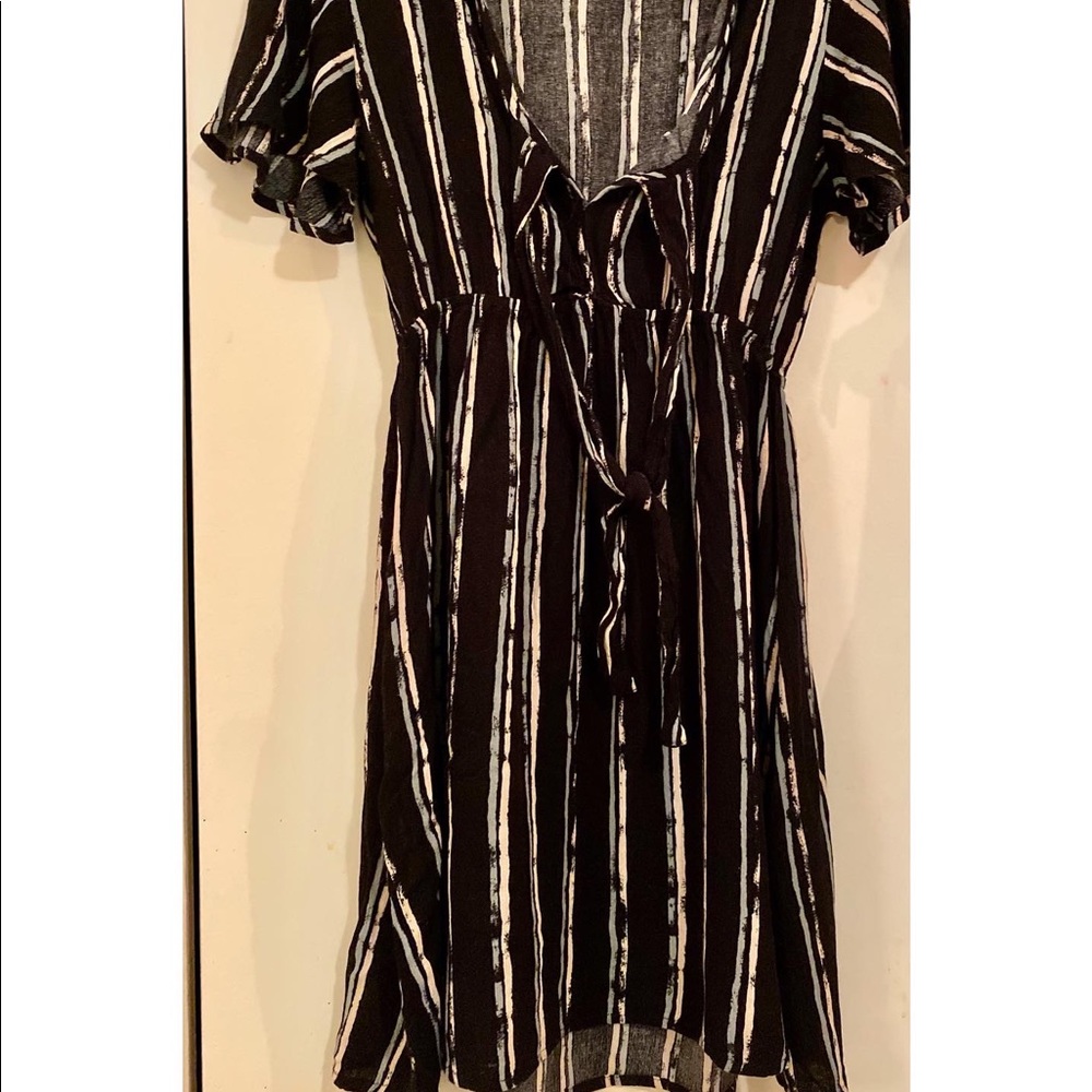 Black Potter’s Pot Dress with pastel green & yellow design. Size: Samll